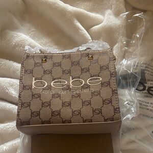 bebe Beige Monogram Mini Crossbody with Gold Studs. Brand new. Never used.